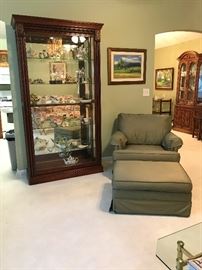 Beautiful Display Cabinet.  Front of Cabinet slides both directions.   Chair and ottoman, Artwork