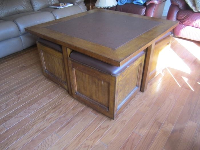 TABLE WITH PULL OUT STOOLS