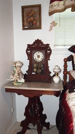 Marble top table, nice mantle clock and oil lamps