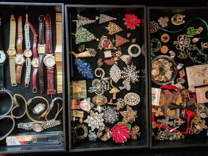 Watches, pins, religious and Irish pendants. 