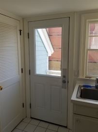 Utility room entry door