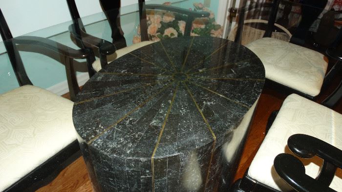CLOSE UP OF TRAVERTINE MARBLE PEDESTAL FOR DINING TABLE