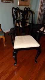 CLOSE UP OF EBONY FRAME ECRU UPHOLSTERED SEAT DINING CHAIR