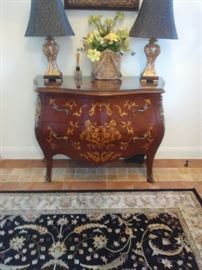 Antique commode french chest was owned by Delta Burke and Gerald McRainey. Lamps on top have sold.