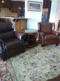Leather recliners, with lazy susan table. Rug shown is no longer there,