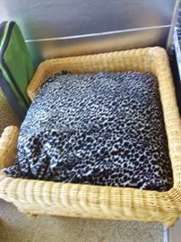 Two cute wicker dog beds