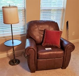 Brown leather chair, floor lamp