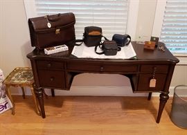 computer desk, accessories, cameras