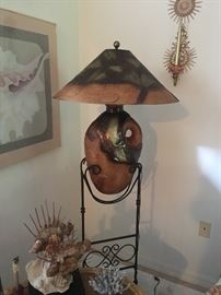 Artisan made metal and leather lamps
