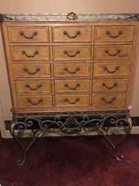 Large chest of drawers on wrought iron legs
