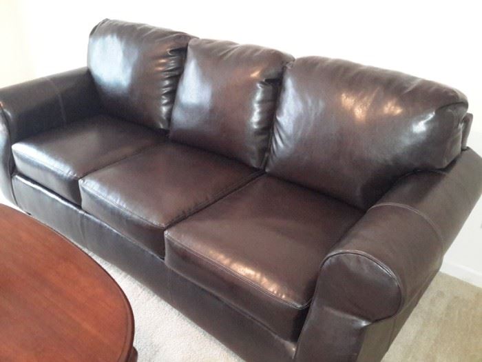 Leather look sofa / like new