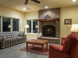 Sofa, two matching recliners, coffee table lamp and one of 3 matching rugs.