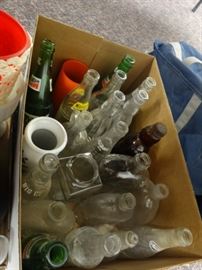 large lot of glass bottles