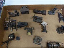 metal salesman figurines