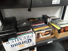 shelf of books, vhs, and dvds