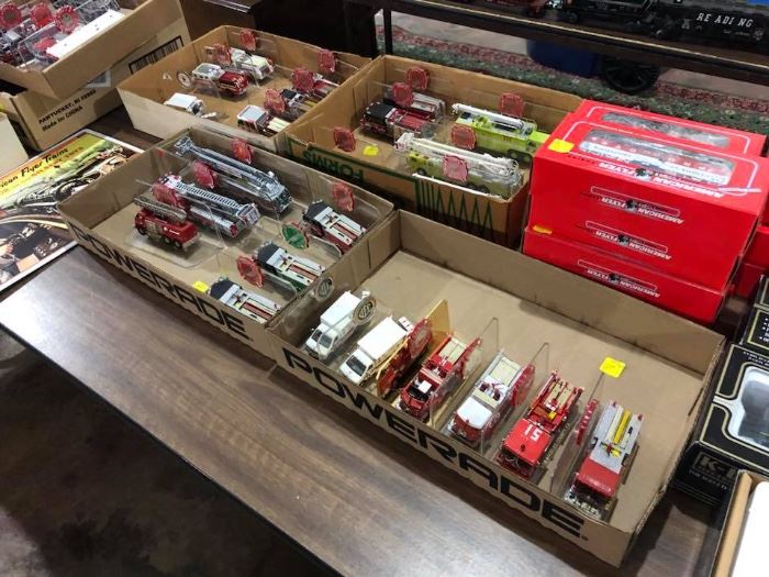 Code 3 and Corgi die cast scale model firetrucks local Illinois, and also lots of New York and other cities. We have most of the boxes too! Some lots available to bid on "live auctioneer" right now. 