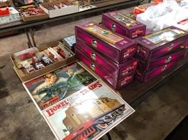 at least 20 twenty tin Lionel and other train signs. 