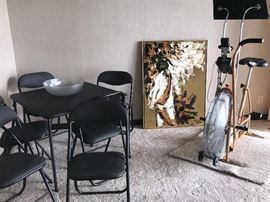Fold table set, wall art, and exercise bike