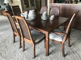 Mid-century or Danish Modern dining table with 2 more leaves and the six chairs shown. No manufacturers' information found.