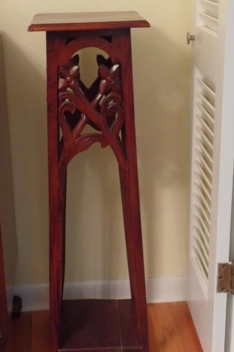 Carved plant stand