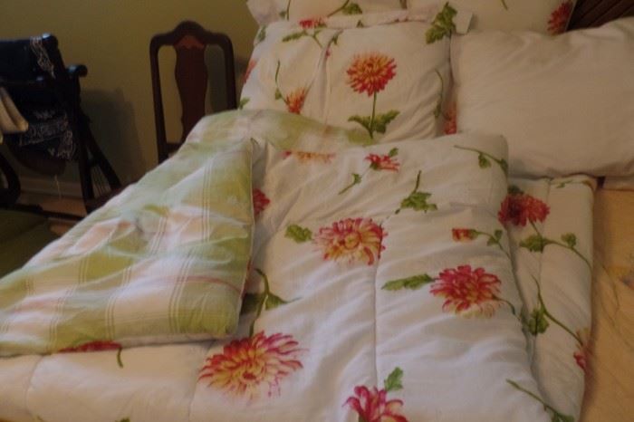 This quilt has matching pillows and bed skirt.