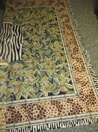 JUNGLE SAFARI LEOPARD RUG WITH ZEBRA TRIM    ( rug is folded in half)
