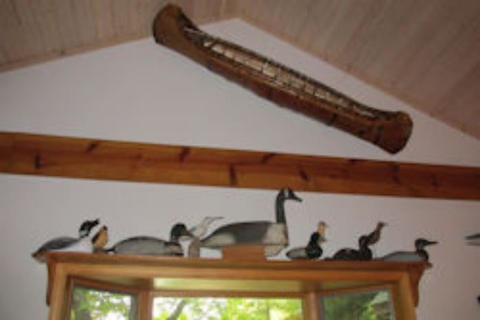 canoe carved birds