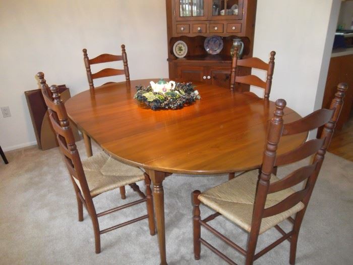 $375.00 Statton? Centennial cherry drop leaf extension dining table with 6 rush seat ladder back chairs