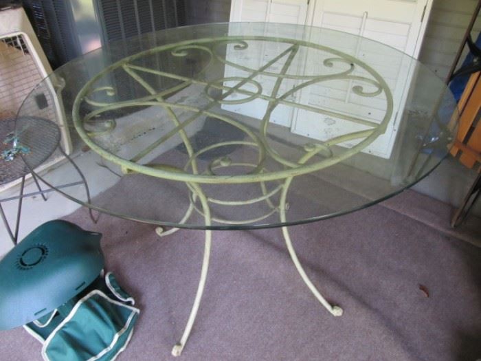 wrought iron patio table with glass top