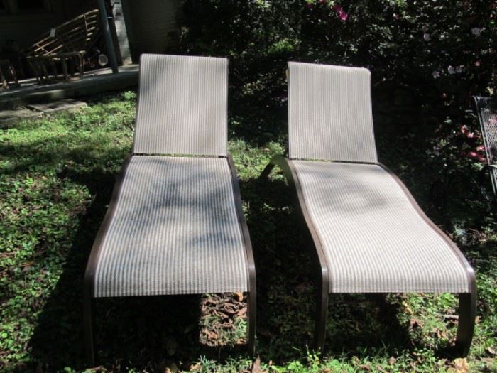 pair of chaise lounges