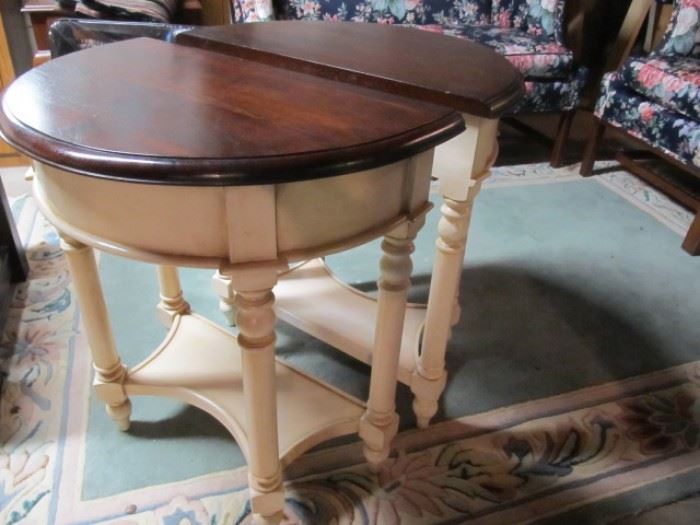 Pair of demi-lune tables-back to back
