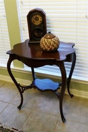 Many antique accent tables throughout