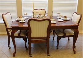 Game table with leaf and four chairs