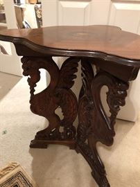 Beautiful 3 legged Carved end table with inlayed top