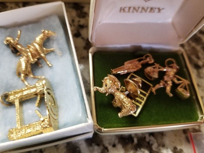 14KT AND 850 CHARMS FROM ALL OVER THE WORLD! ALL VINTAGE TOO, SO THEY'RE MUCH NICER!