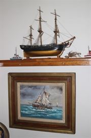 Model boats and oil painting.