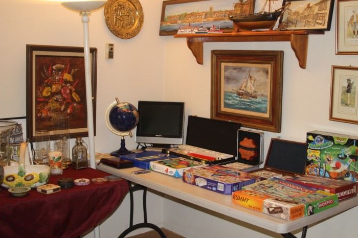Board games, dominoes, globe, small TV, art work. Royal coasters., Princess Diana stemware.