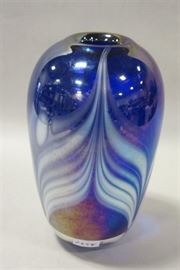 Iridescent art glass vase with pulled feather pattern