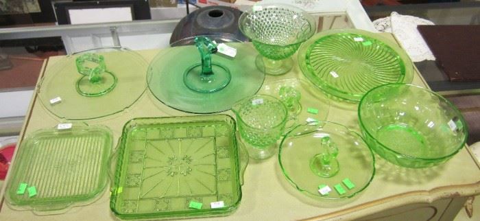 Green Depression glass.  Uranium oxide in these causes this to glow under blacklight.  Also known as  Vaseline glass.  This collection to be sold as one lot.  