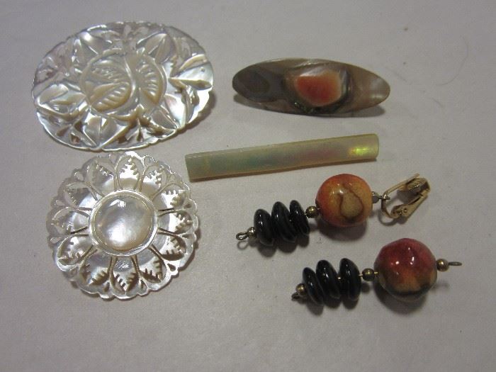 carved mother of pearl pins, old shell pins, drop pendants with sponge coral