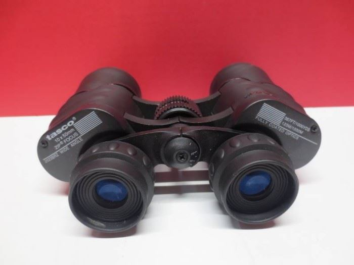 1 Tasco 10x50 zip focus.