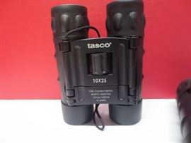 Lot of 2 Tasco 10x25 binoculars.