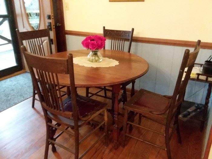 Mahogany Drop-Leaf Table and Press-Back Chairs