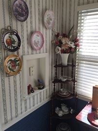 Many decorator plates. corner shelf