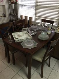 Contemporary dining table and four chairs.