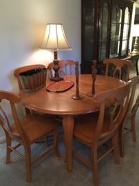 Contemporary solid wood dining table/6 chairs.