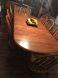 Solid oak dinette with 8 chairs and matching china cabinet