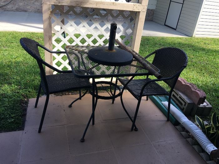 Wrought iron table with chairs