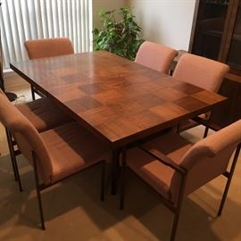 Mid Century Lane Brutalist Dining Table. Two leafs, and 6 chairs.
This table is in amazing condition. One owner and always had a table pad on the top.
