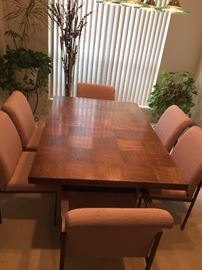 Mid Century Lane Brutalist Dining Table. Two leafs, and 6 chairs.
This table is in amazing condition. One owner and always had a table pad on the top.
